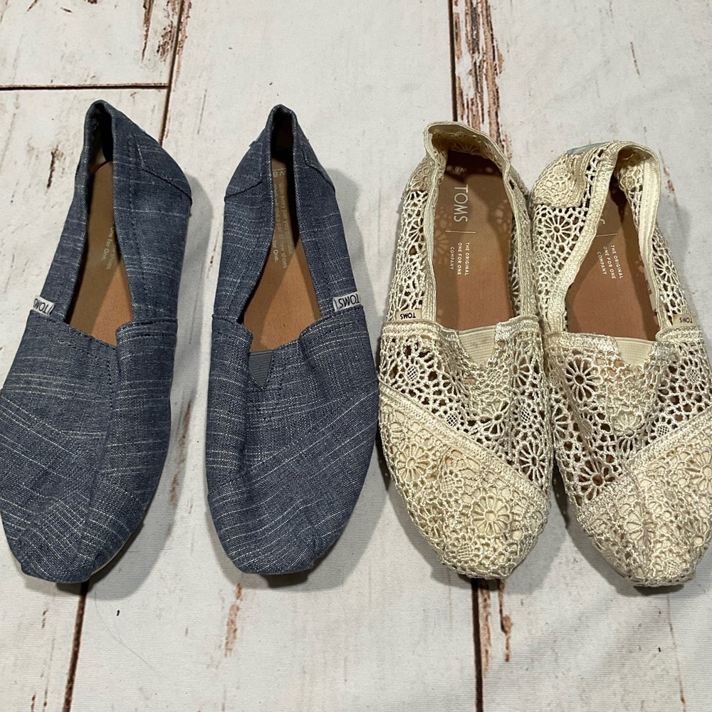 TWO PAIRS OF TOMS SLIP ON SHOES